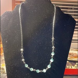 Shiny Black with sky blue beads and silver accent